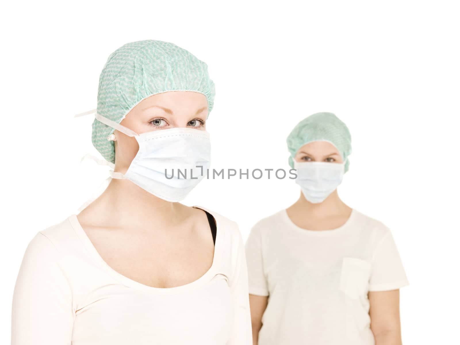 Two Female nurses isolated on white background