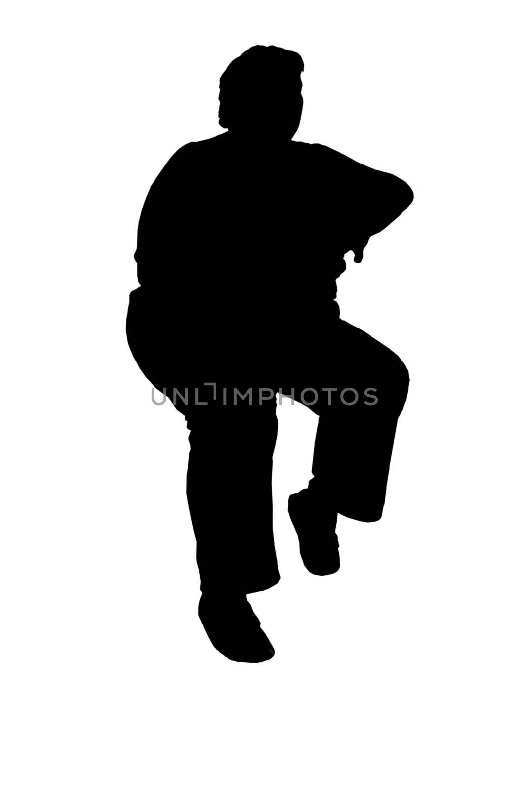 person in a sitting position as a silhouette