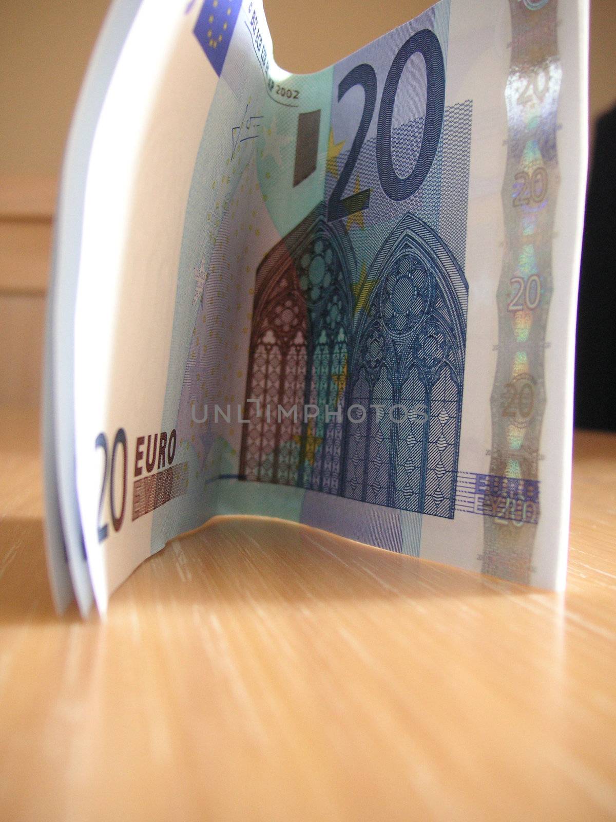 folded twenty euros on a table