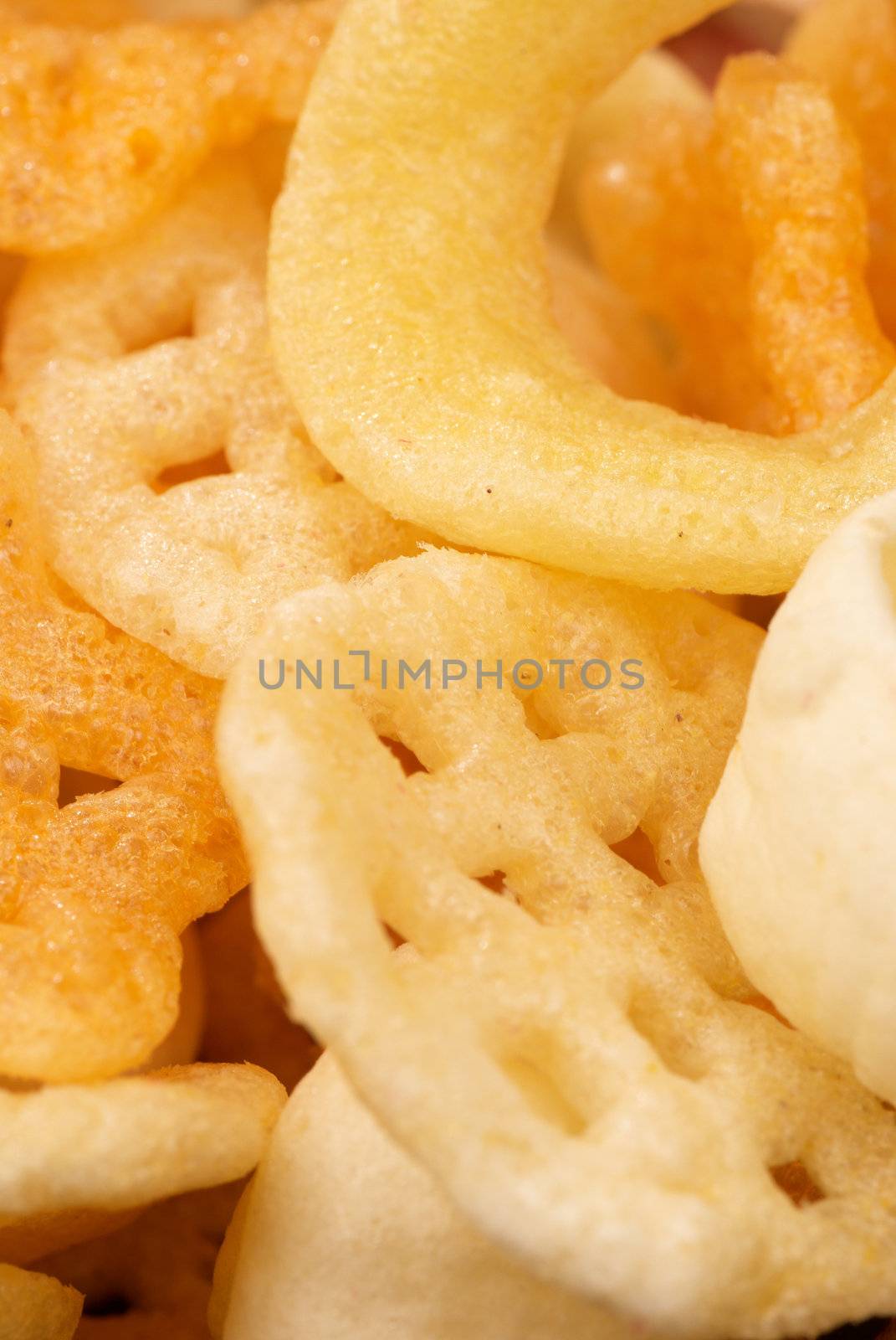 Assortment of potato, rice and maize crackers, food background