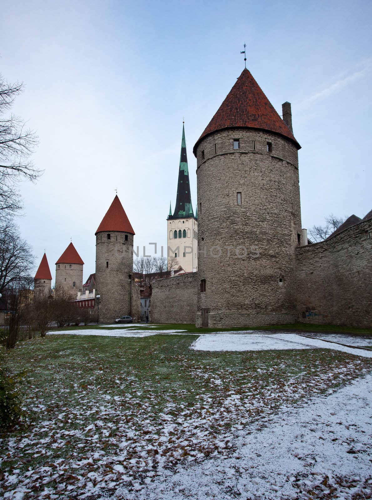 Ancient stone walls of Tallinn with four towers in alignment
