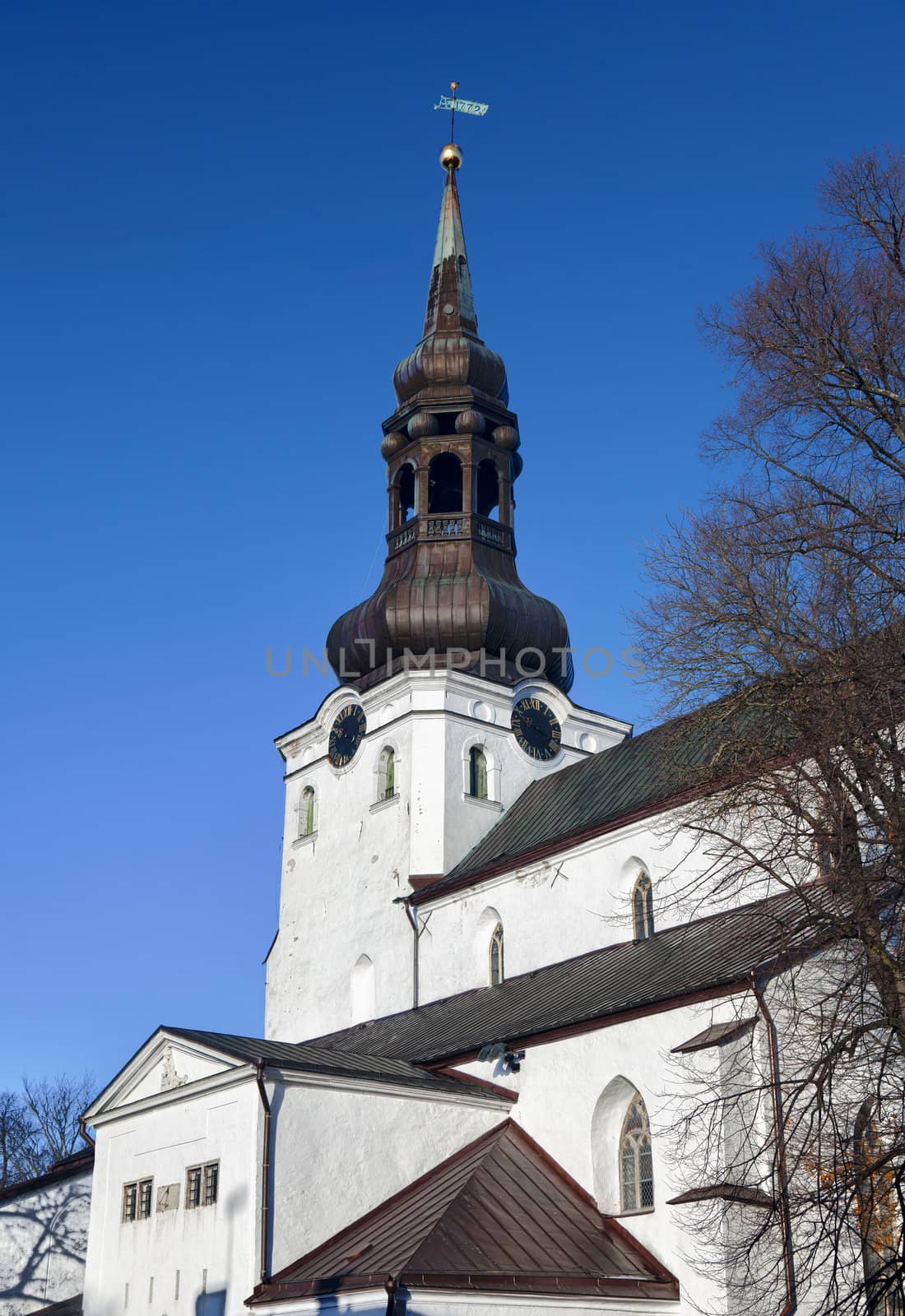 Dome Church in Estonia in Tallinn with a close up of the bronze spire and bell tower