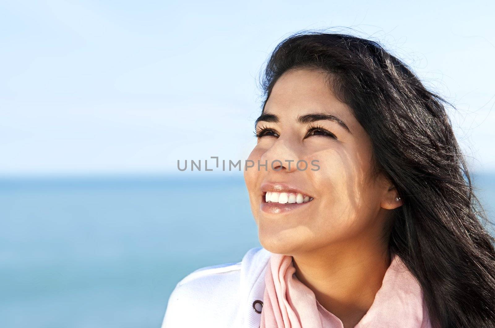 Portrait of beautiful smiling hopeful native american girl