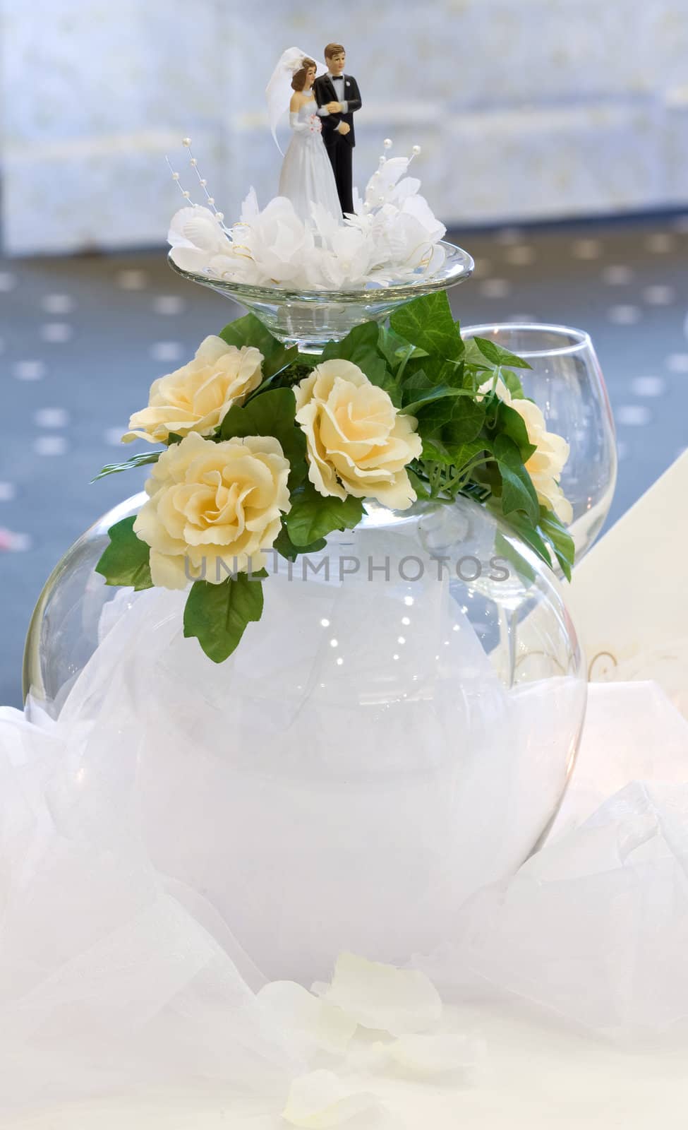 Wedding table decoration. Couple dolls. Inverted glass