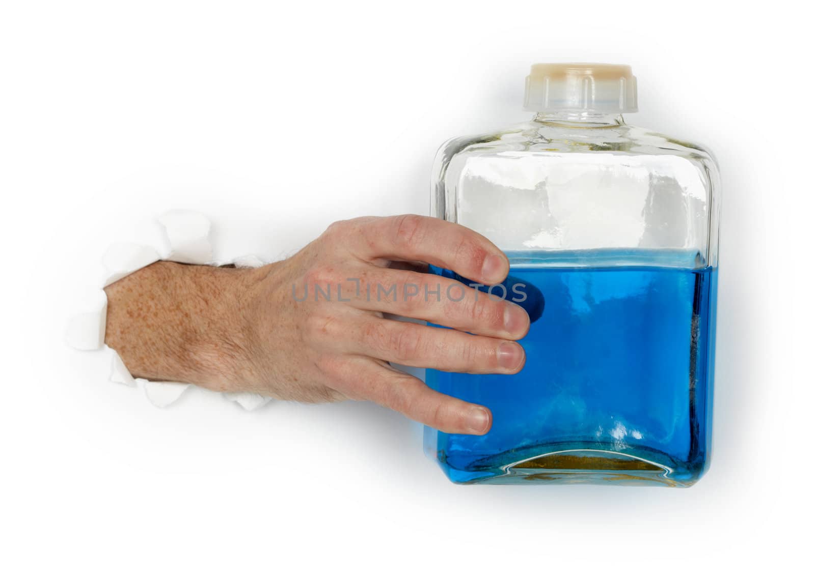 Hand holds bottle of flammable blue liquid  by pzaxe