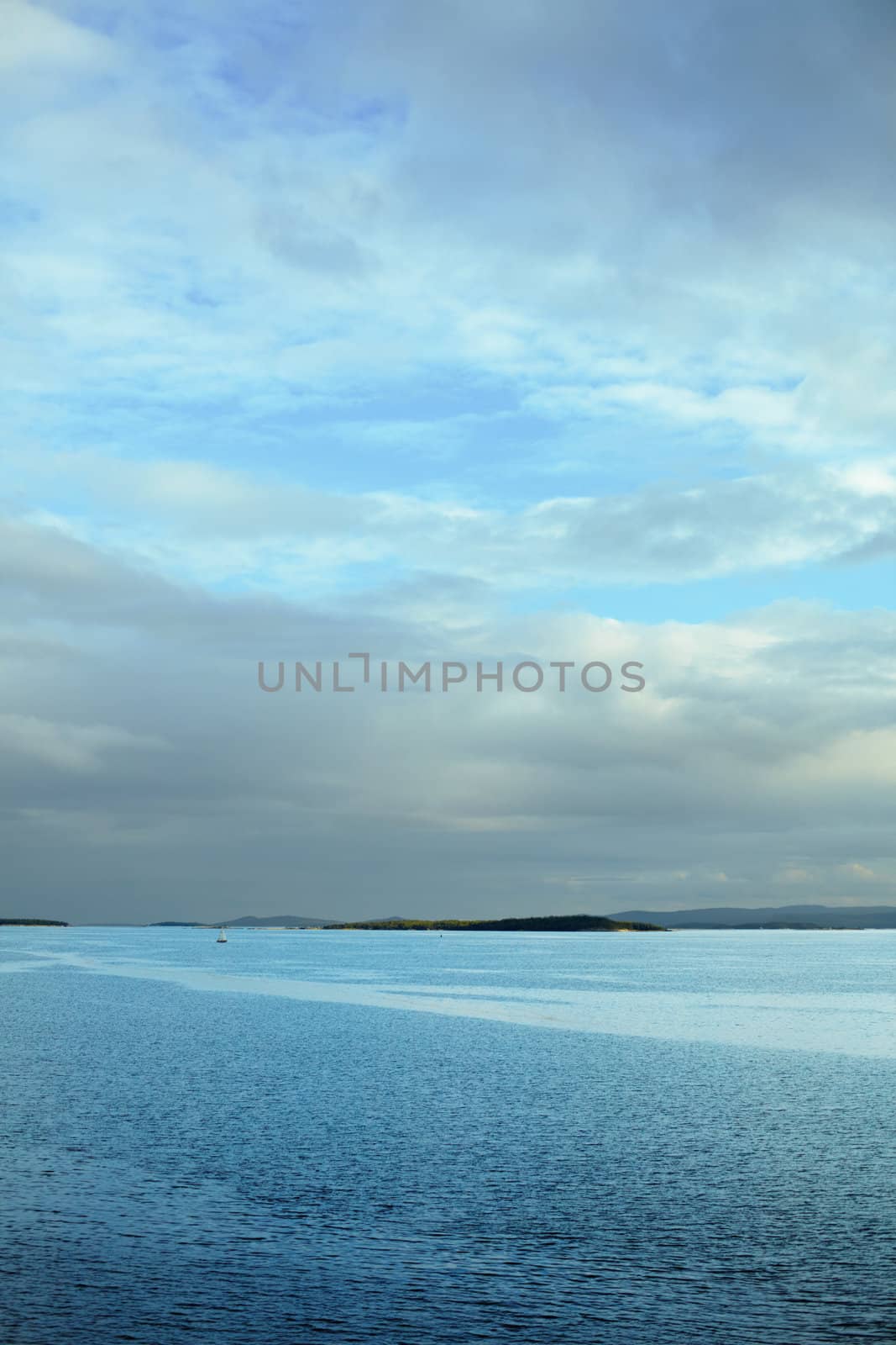 Vertical sea landscape with a horizon line in third of shot