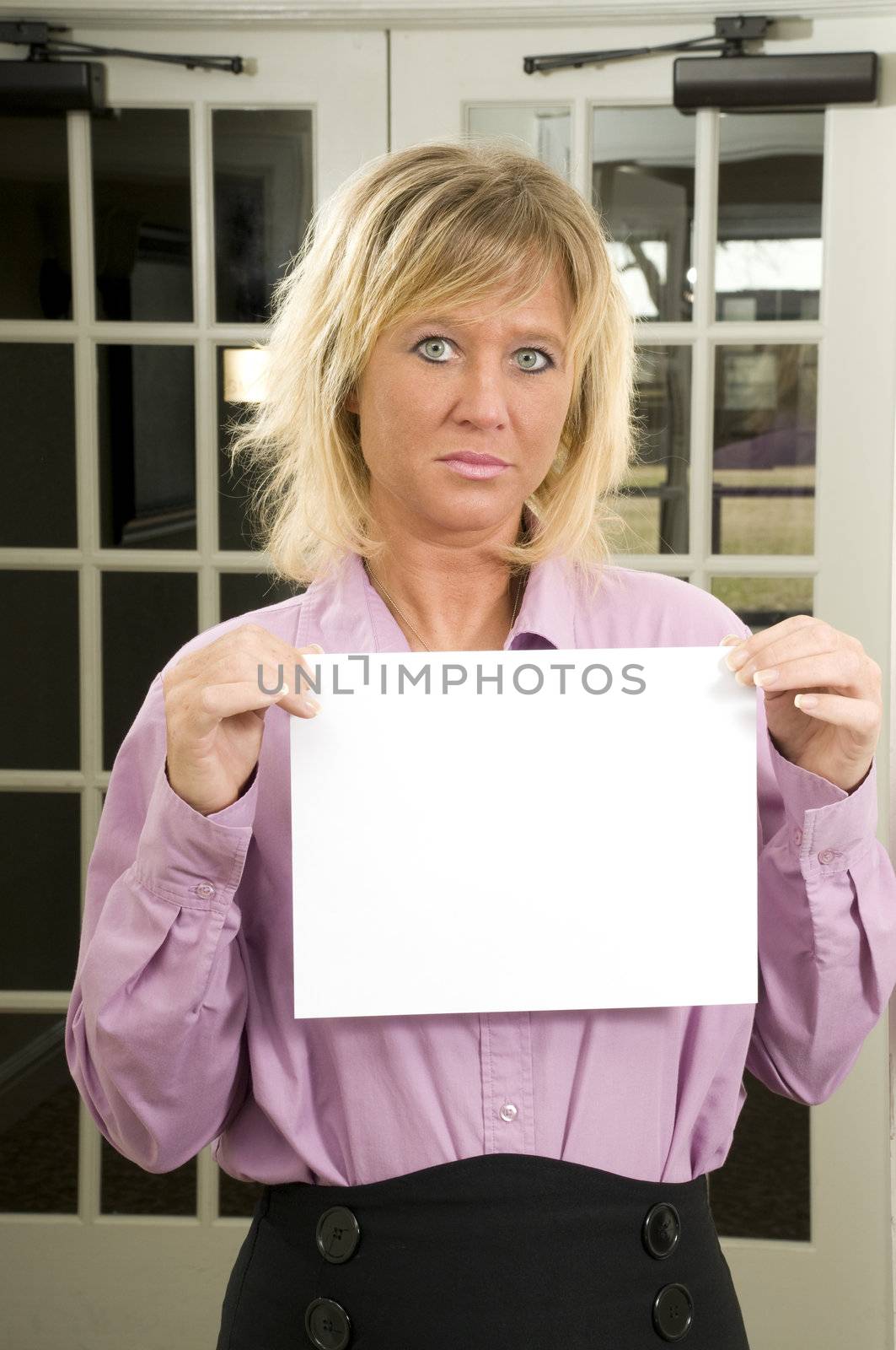 Woman with blank page by PDImages