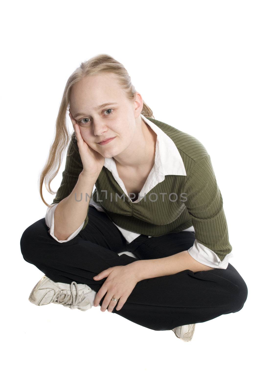 young woman in casual dress witting on the floor