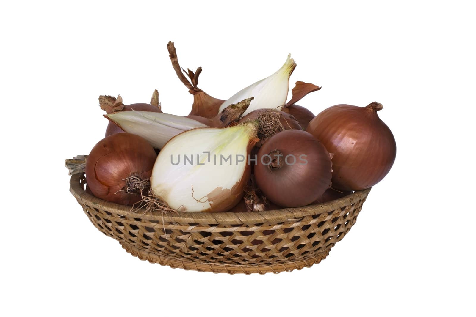Onion whole and half on the wicker wooden vase in isolated over white