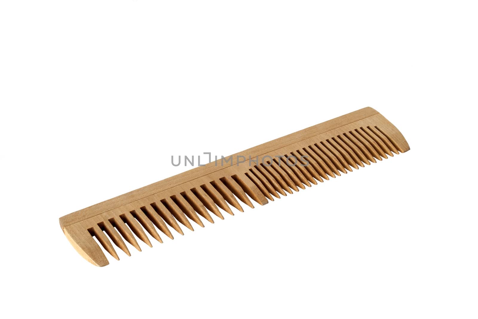 Wooden women comb in isolated over white background