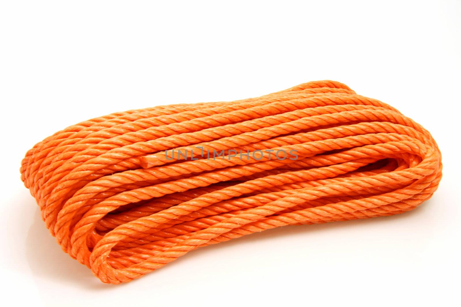 Orange rope on bright background