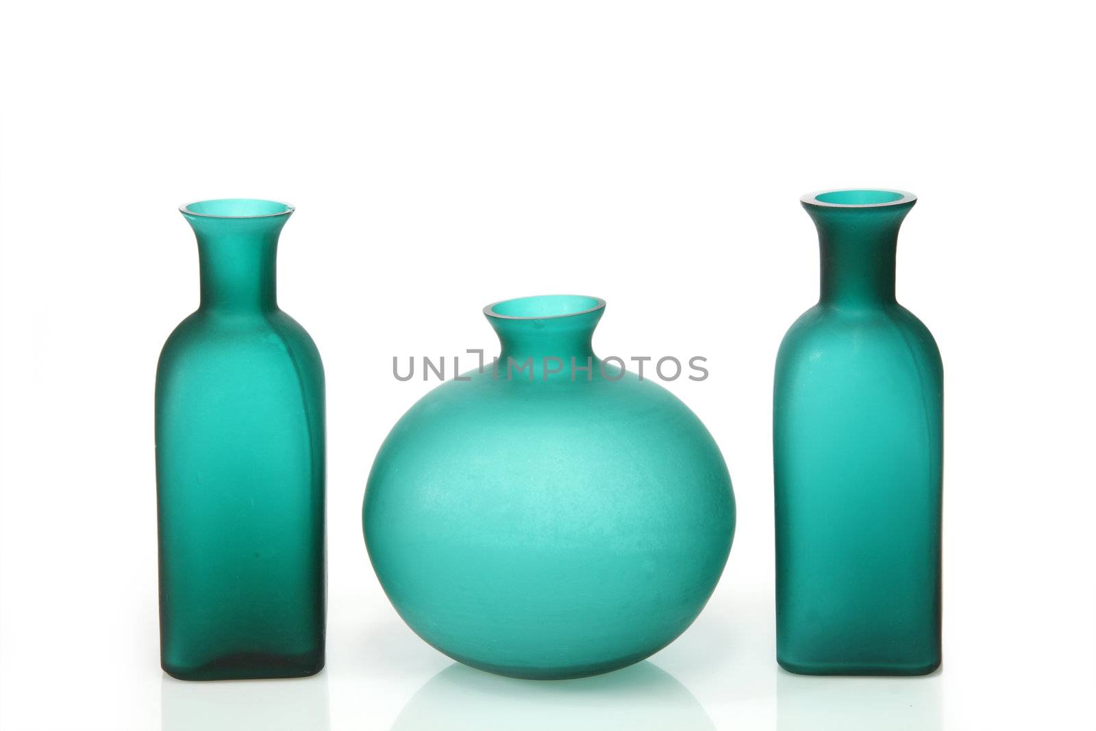 Modern green vases on bright background