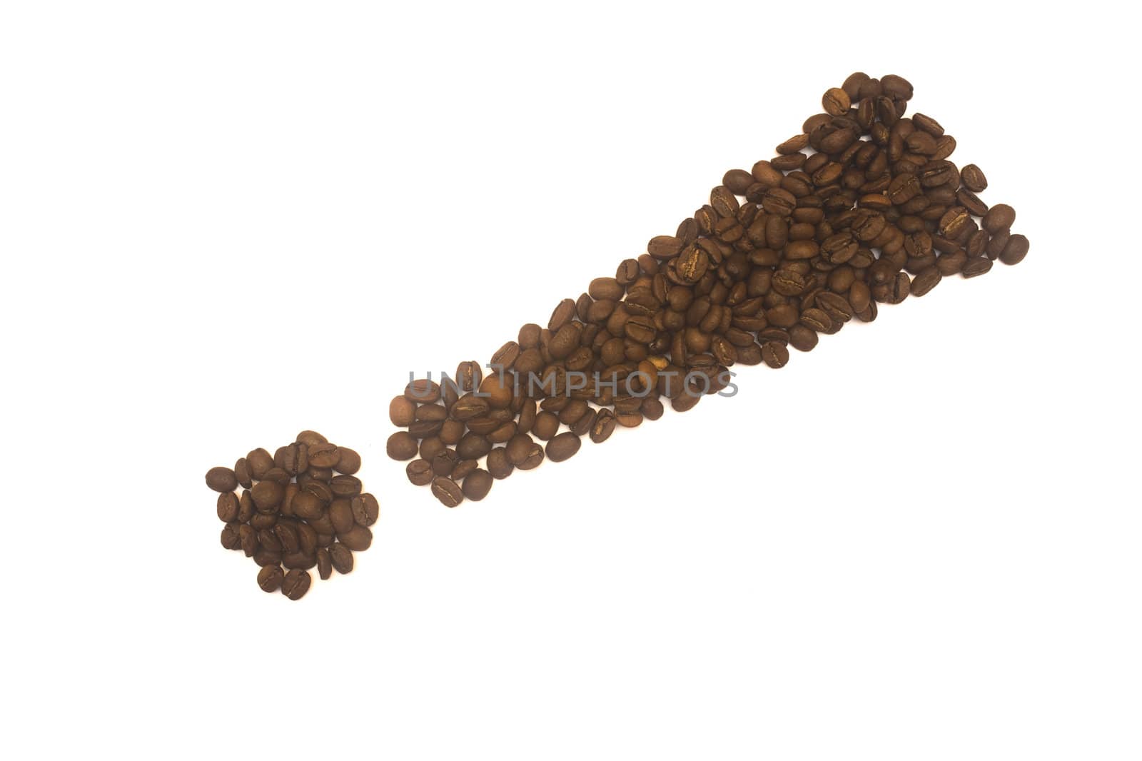 A exclamation mark made from roasted coffee grains, isolated on a white background.