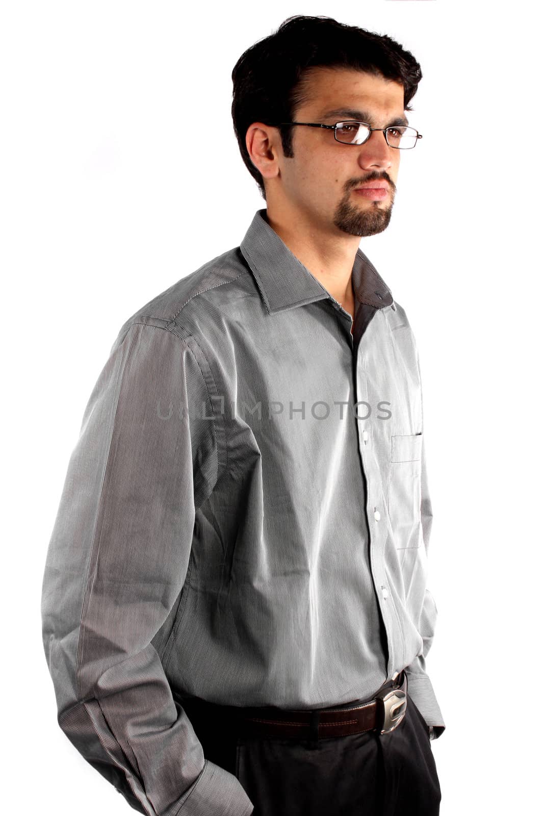 A smart looking young Indian guy, on white background.
