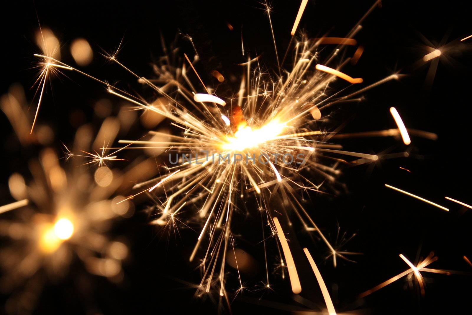 burning sparkler on New Year�s Eve