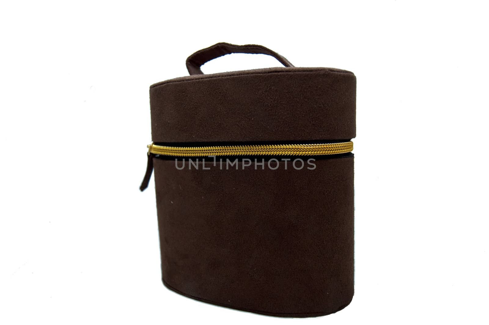 Brown cosmetic bag on white