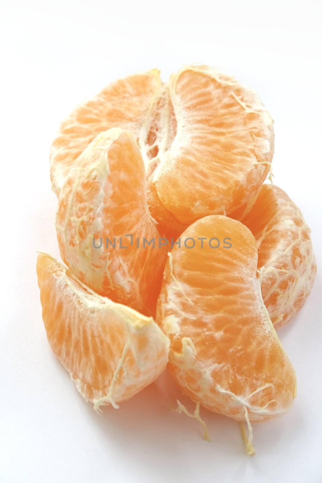 fresh orange pieces by leafy