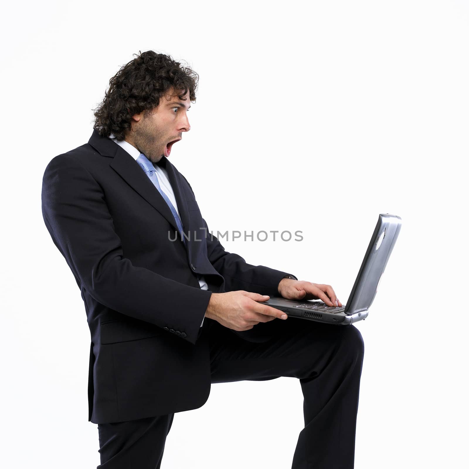 businessman with laptop isolated on white