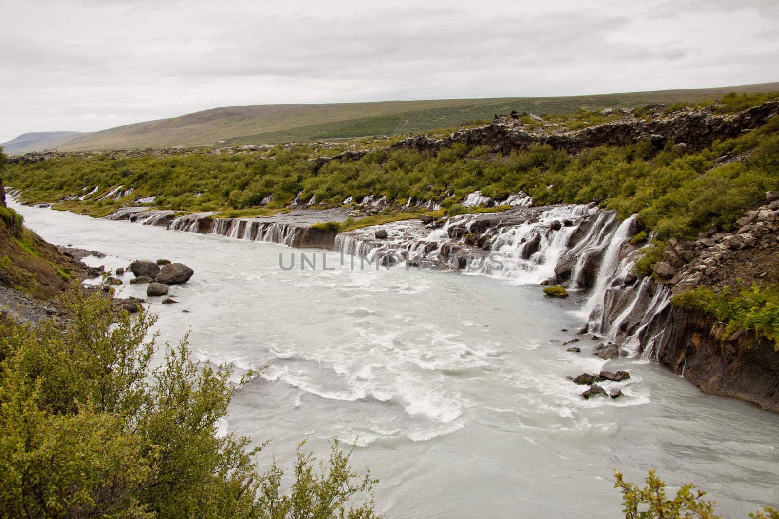 Landscape in Iceland. Big and beauty waterfall Hraunfossar.