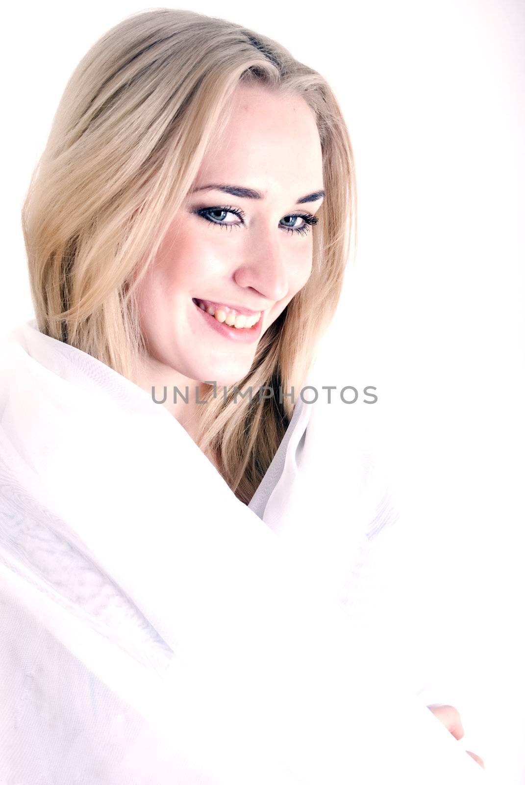  young blonde looking happy over white