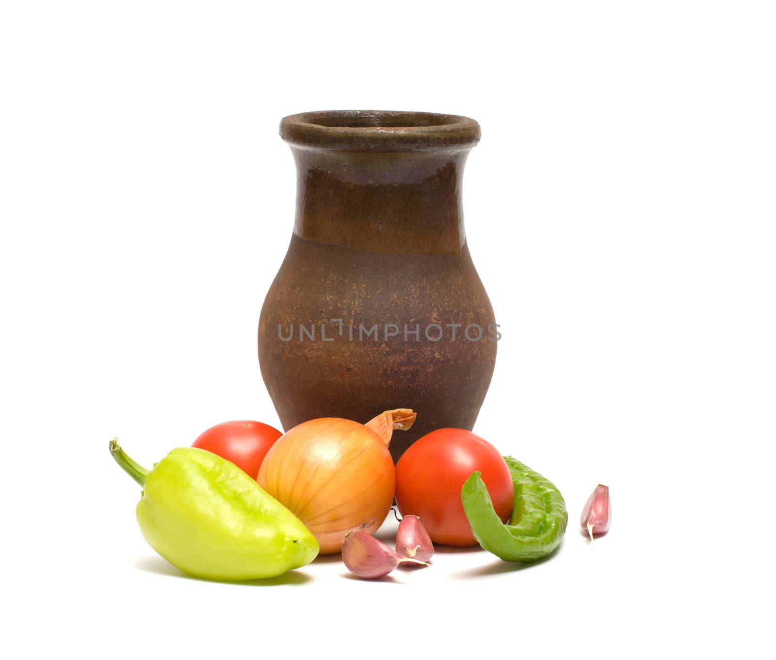 Still life with old clay jug on a white background.