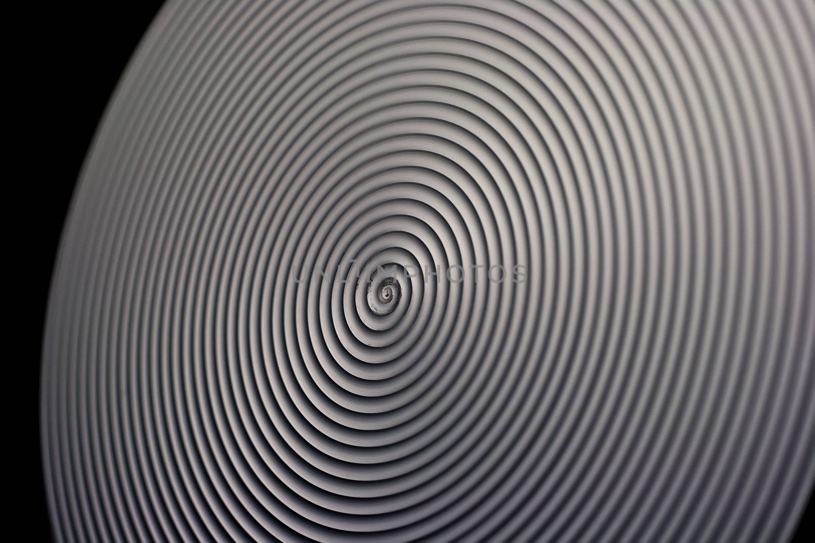 Stainless steel radial texture.  
