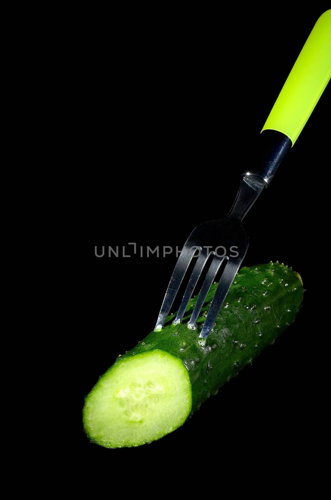 cucumber with fork by keko64