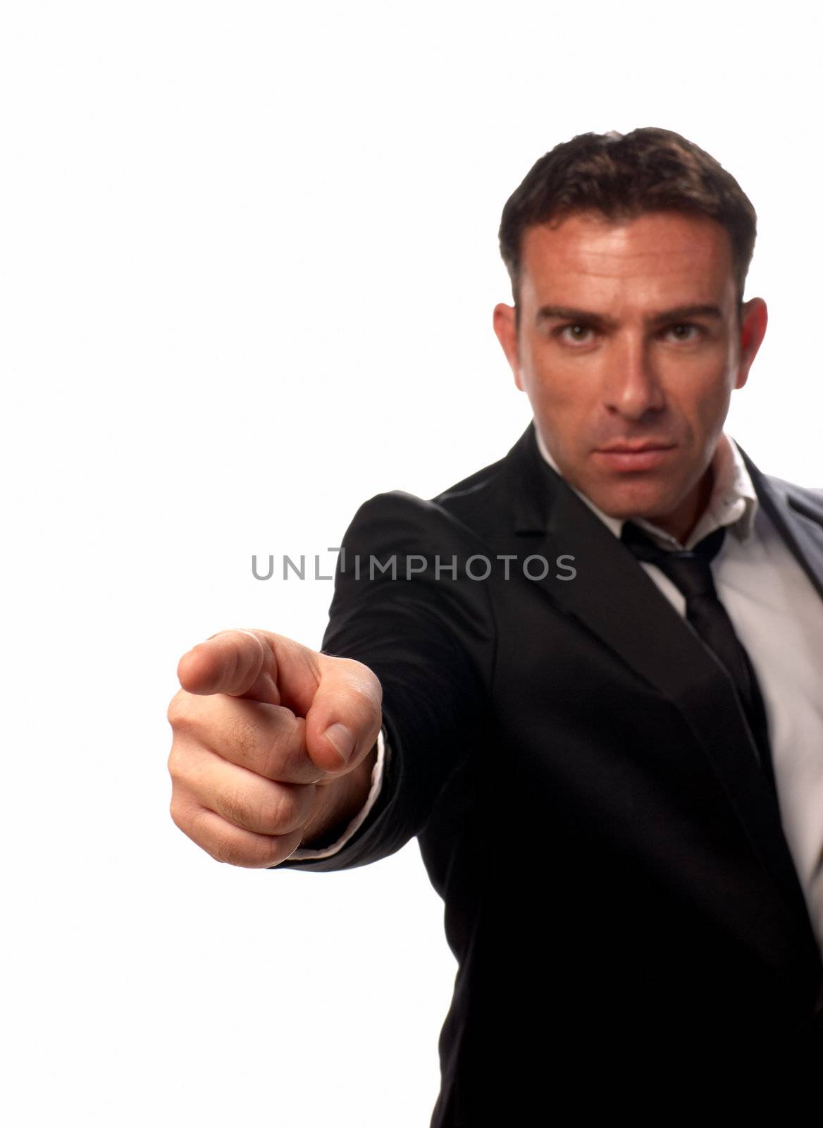 Attractive dressed up guy pointing with his finger