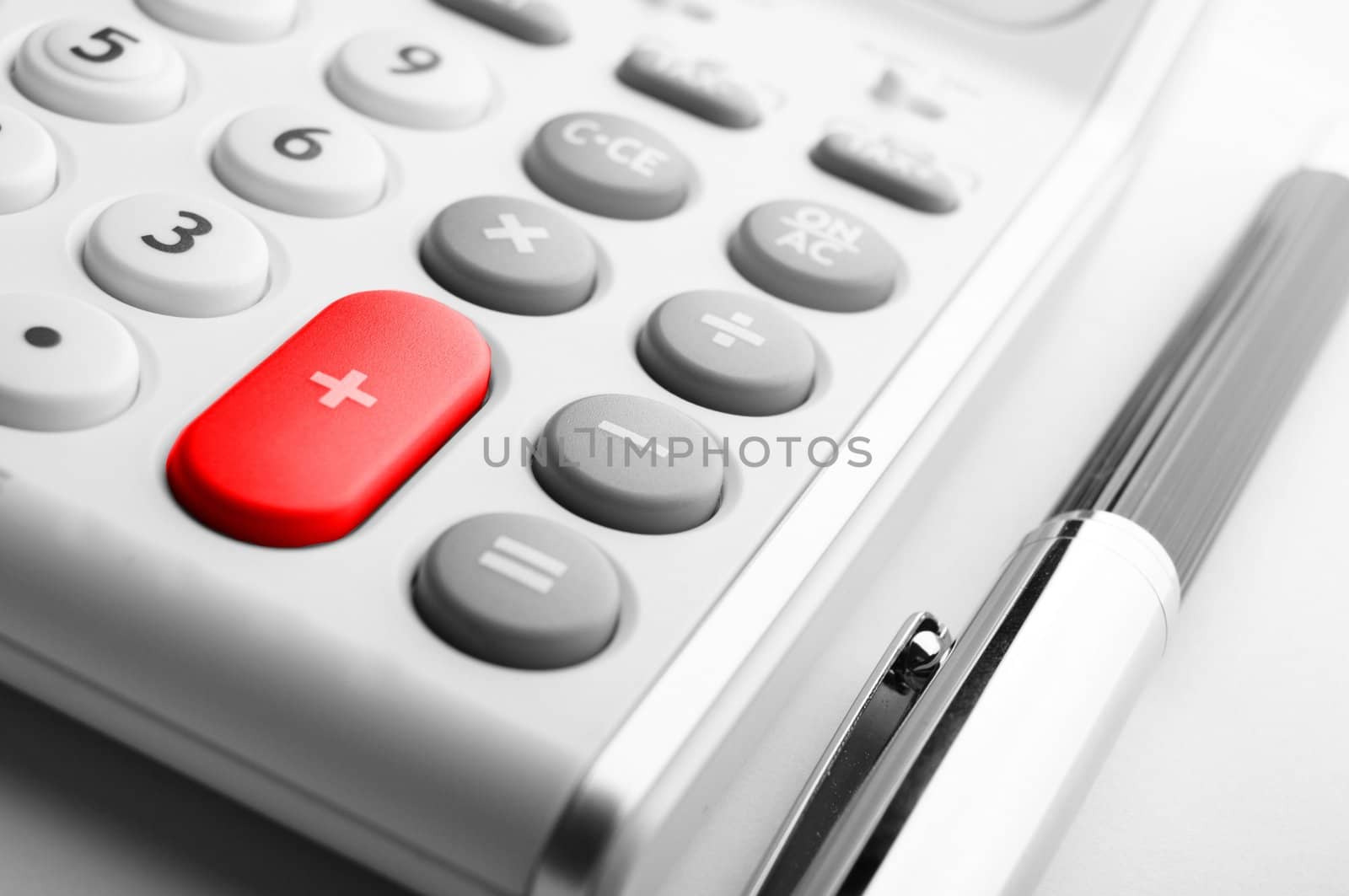 business calculation concept with modern white calculator