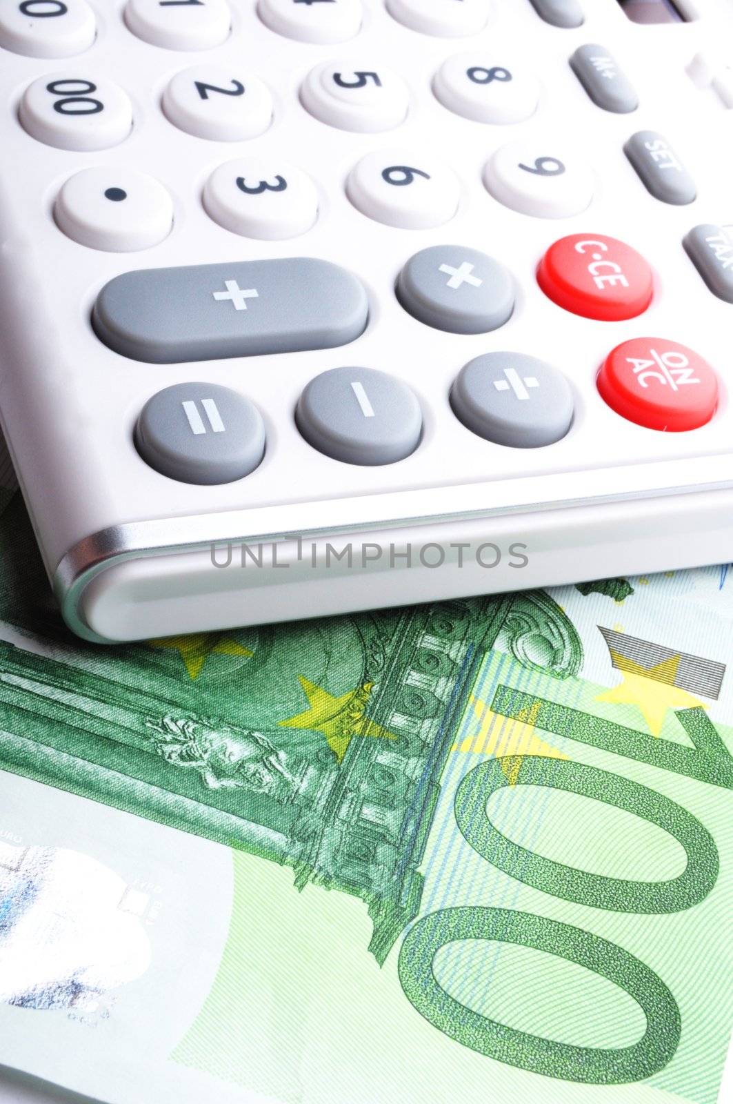 calculator and euro money showing accounting or finance concept