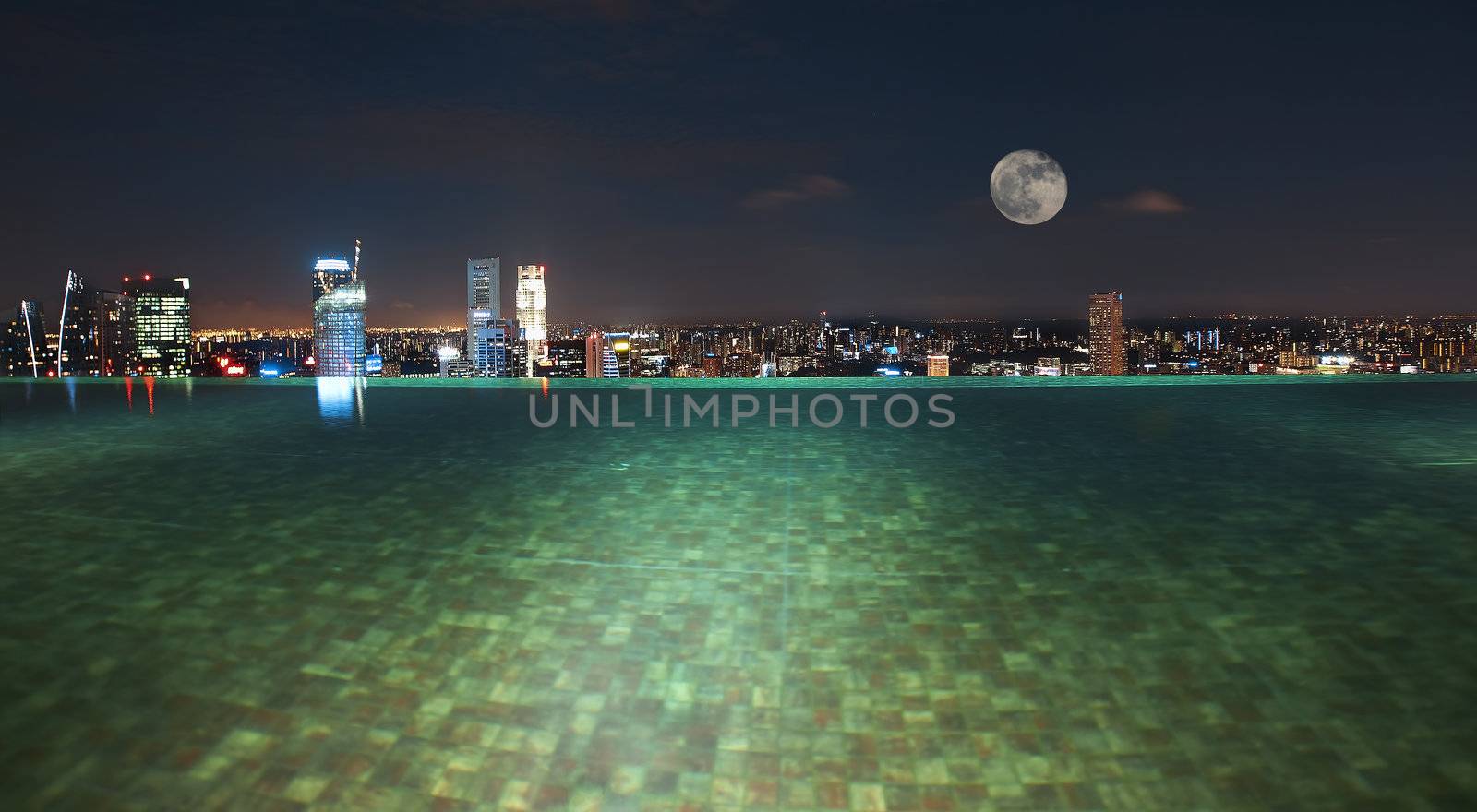 Singapore from swimming pool area on a skyscraper rooftop