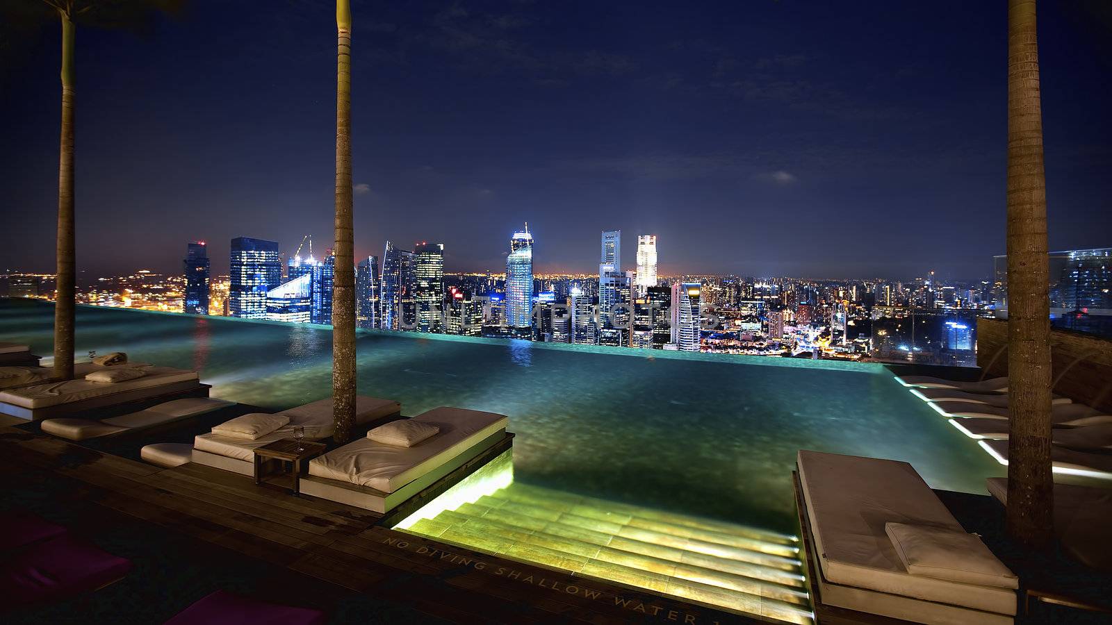 Singapore from swimming pool area on a skyscraper rooftop