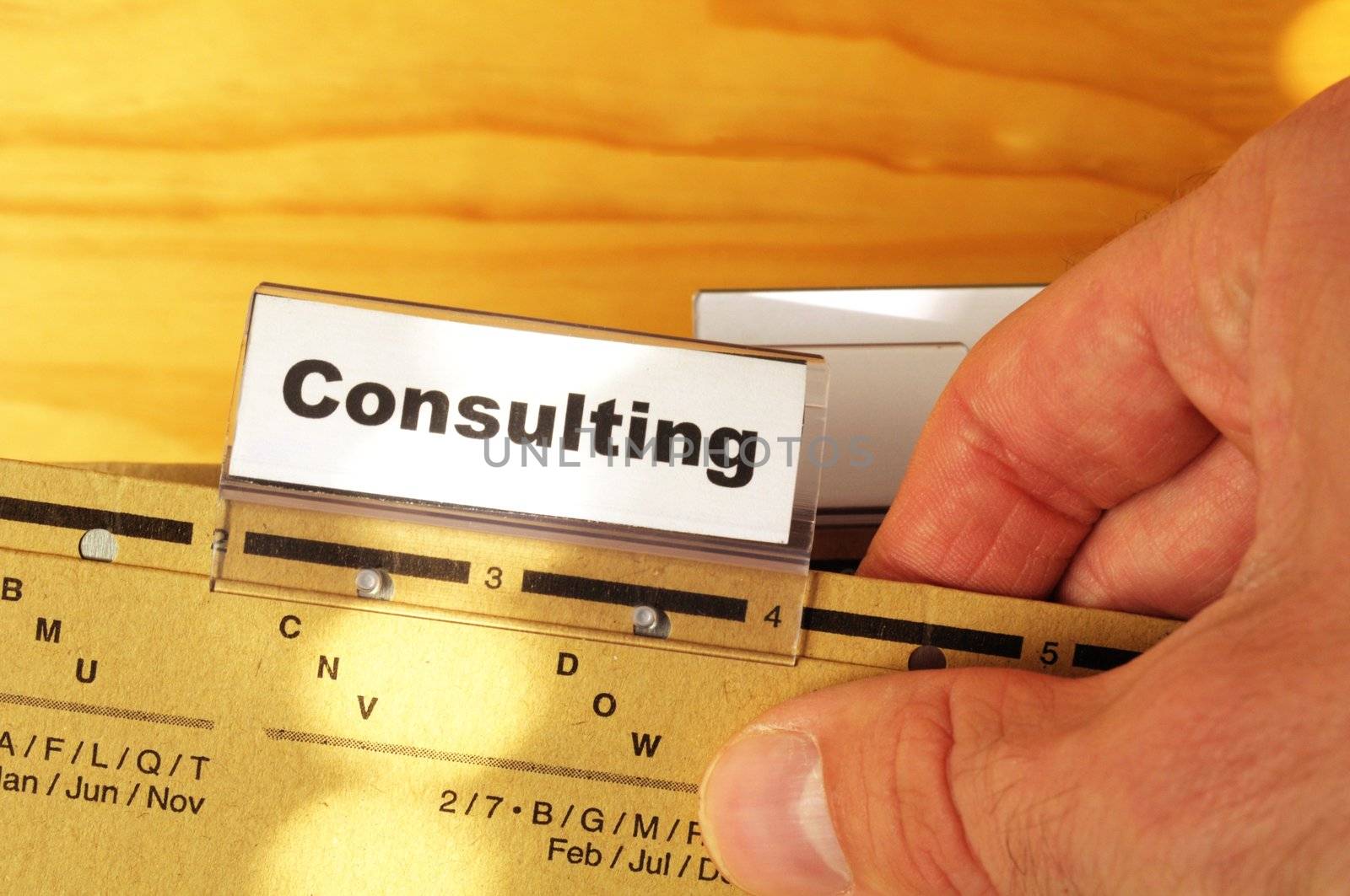 consulting word on business office folder rider showing financial success concept