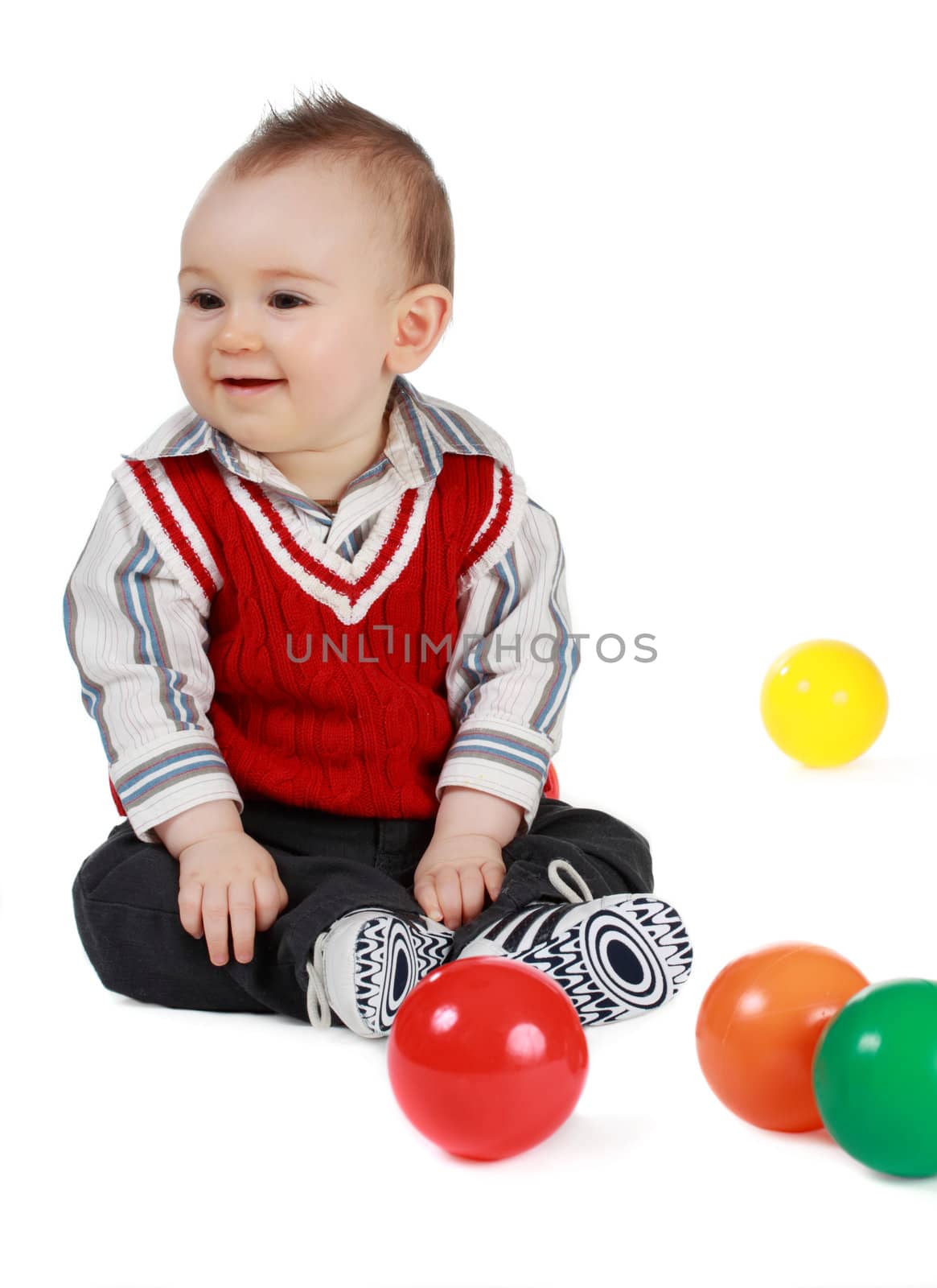 adorable 8 months cacasian baby boy, white background