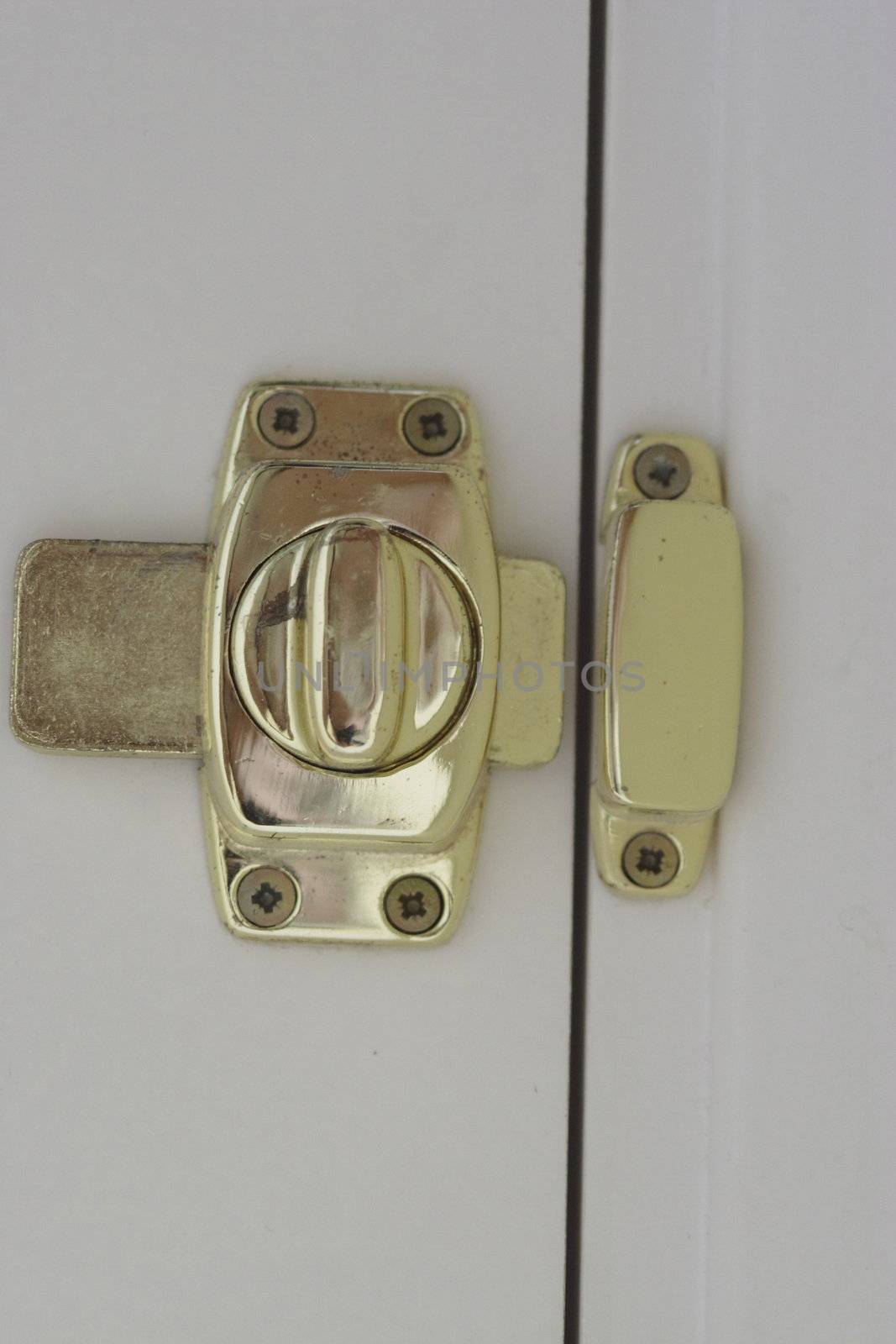 brass door lock the type used on a bathroom 