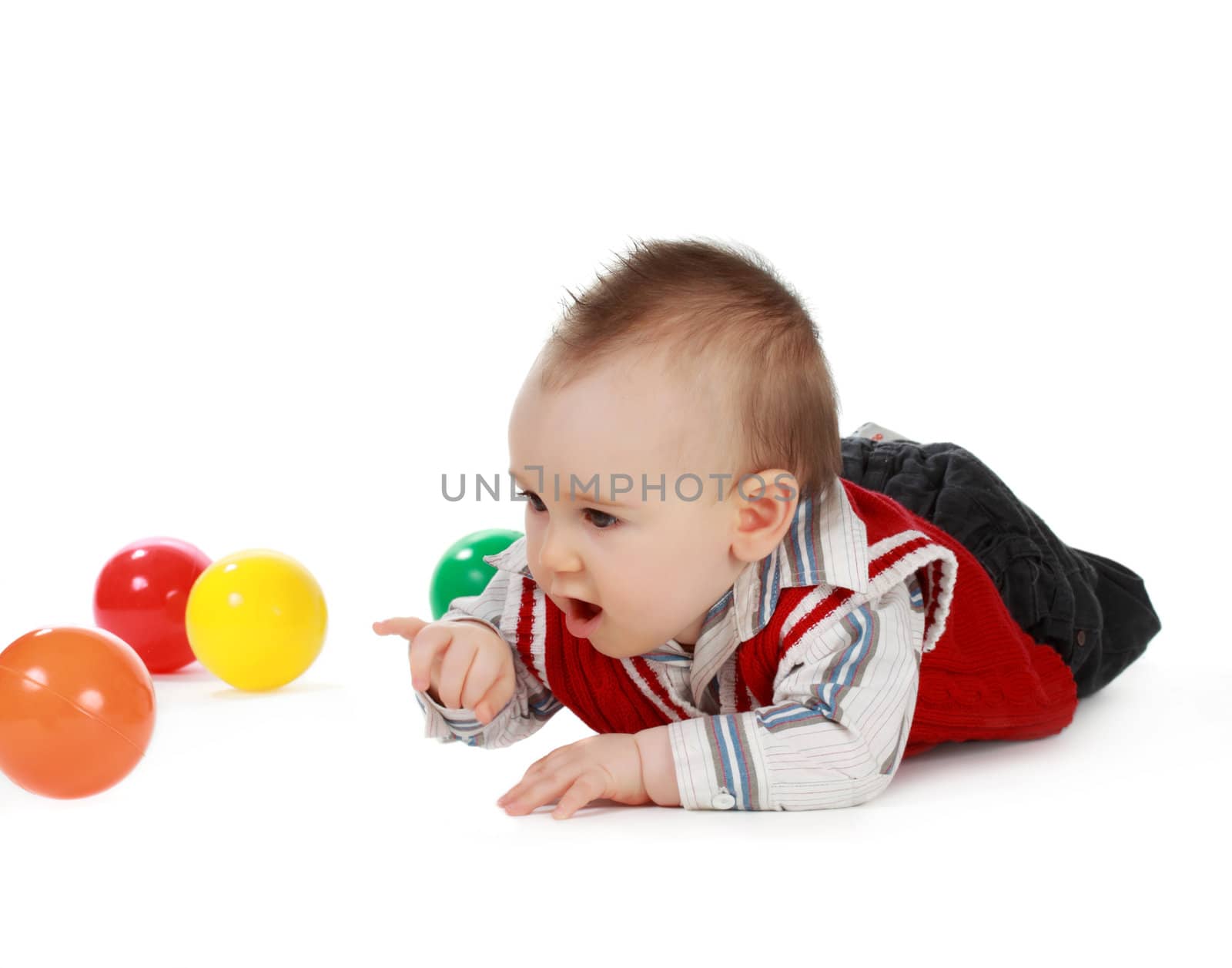 adorable 8 months cacasian baby boy, white background