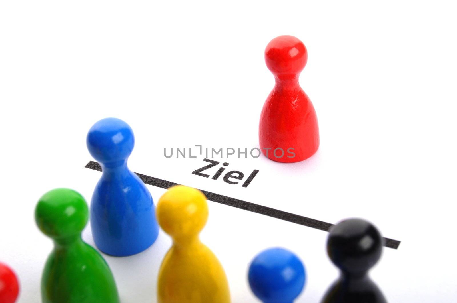success or goal concept with pawns on white