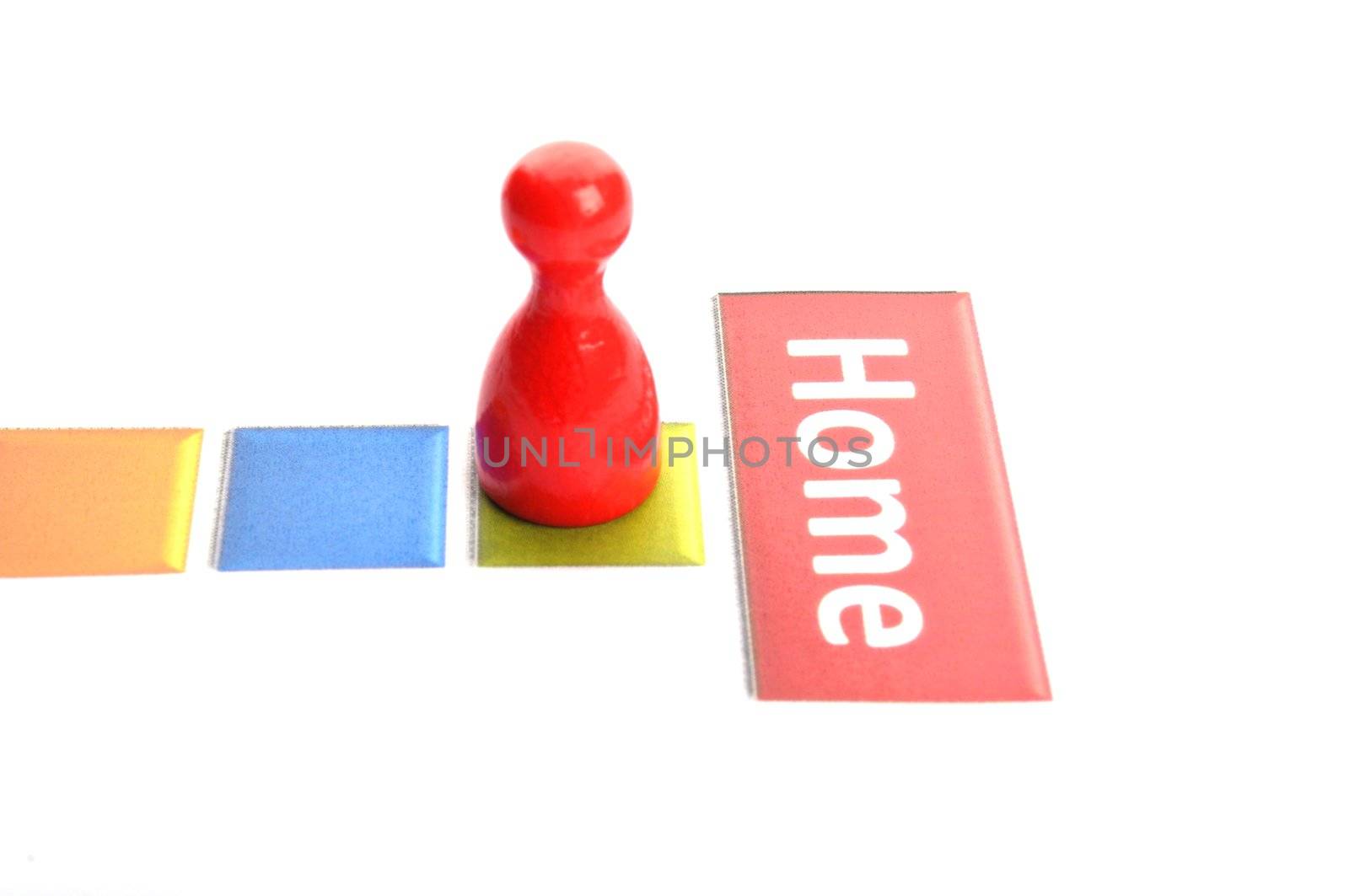 getting home concept with word and pawn on white