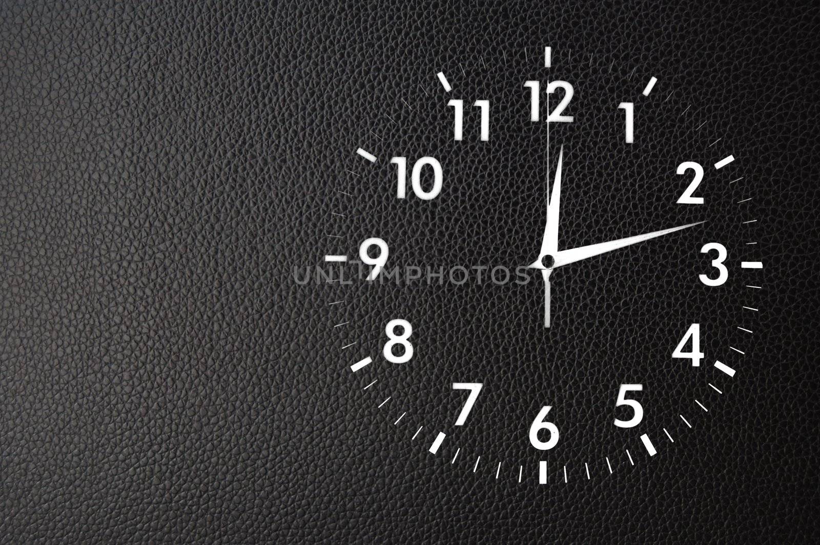 clock or watch on a wall with copyspace showing time concept