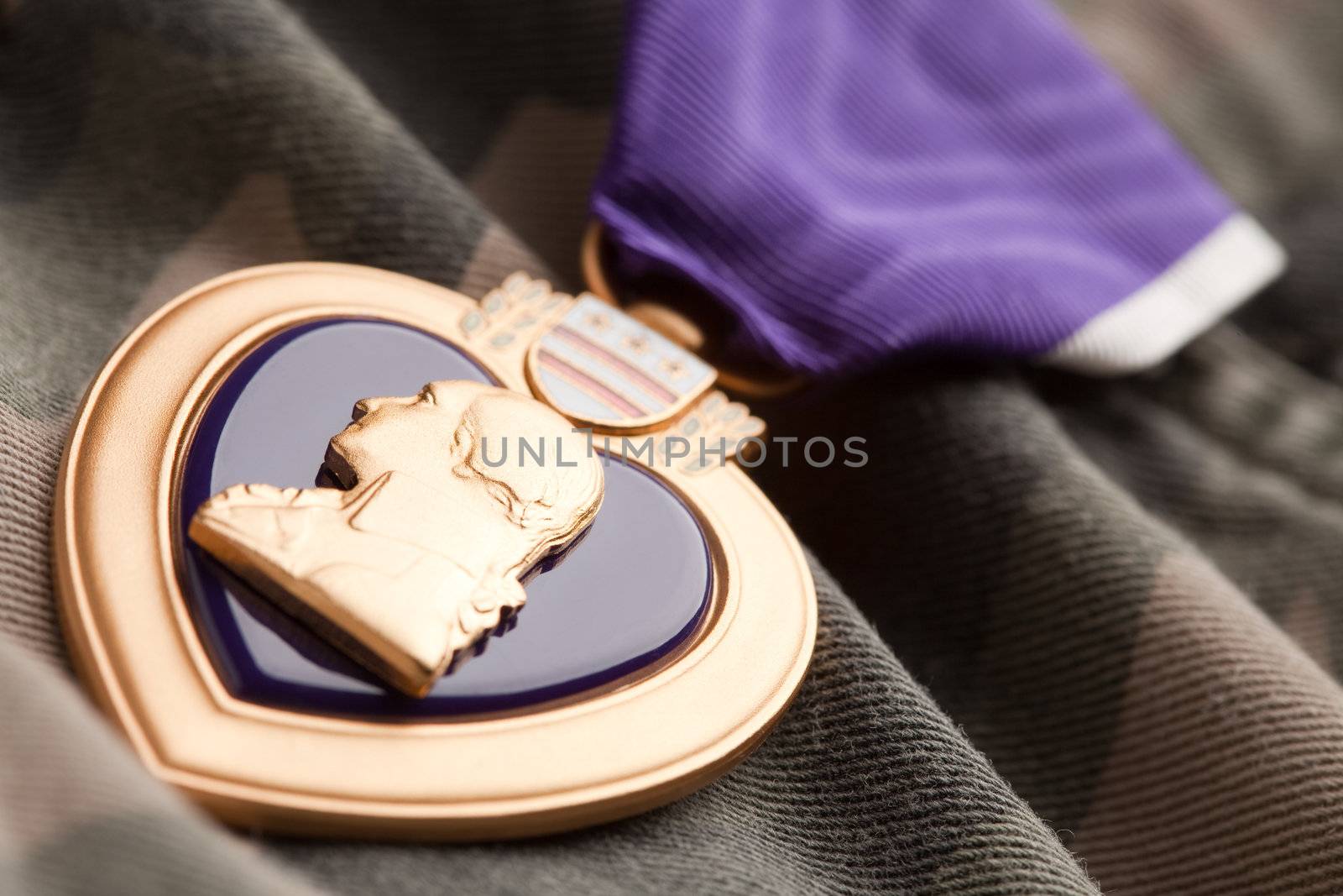 Purple Heart War Medal on Camouflage Material