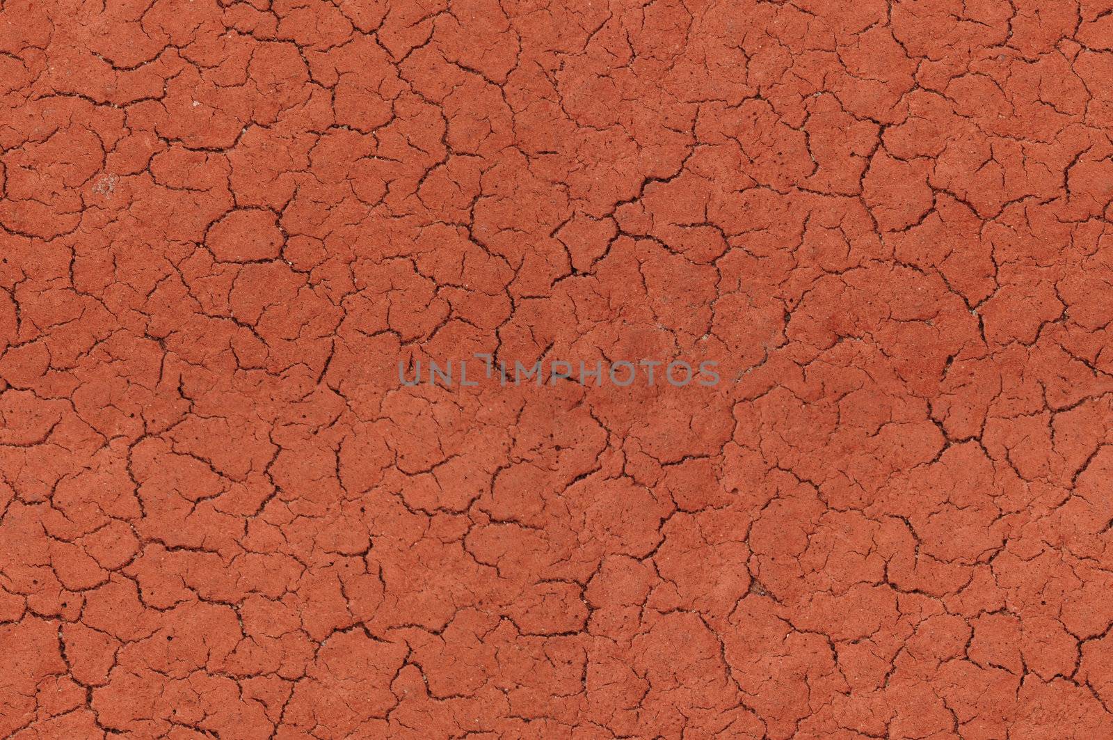 Cracked red textured surface background, seamlessly tileable