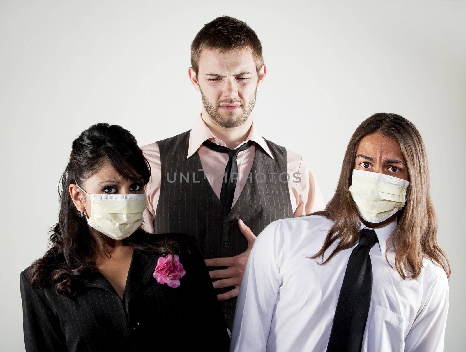 Sick man and worried coworkers in masks by Creatista