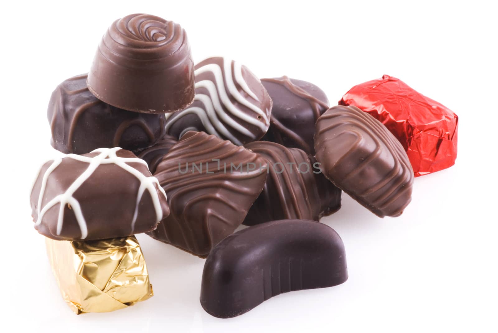 Bunch of belgian chocolates isolated on a white background.