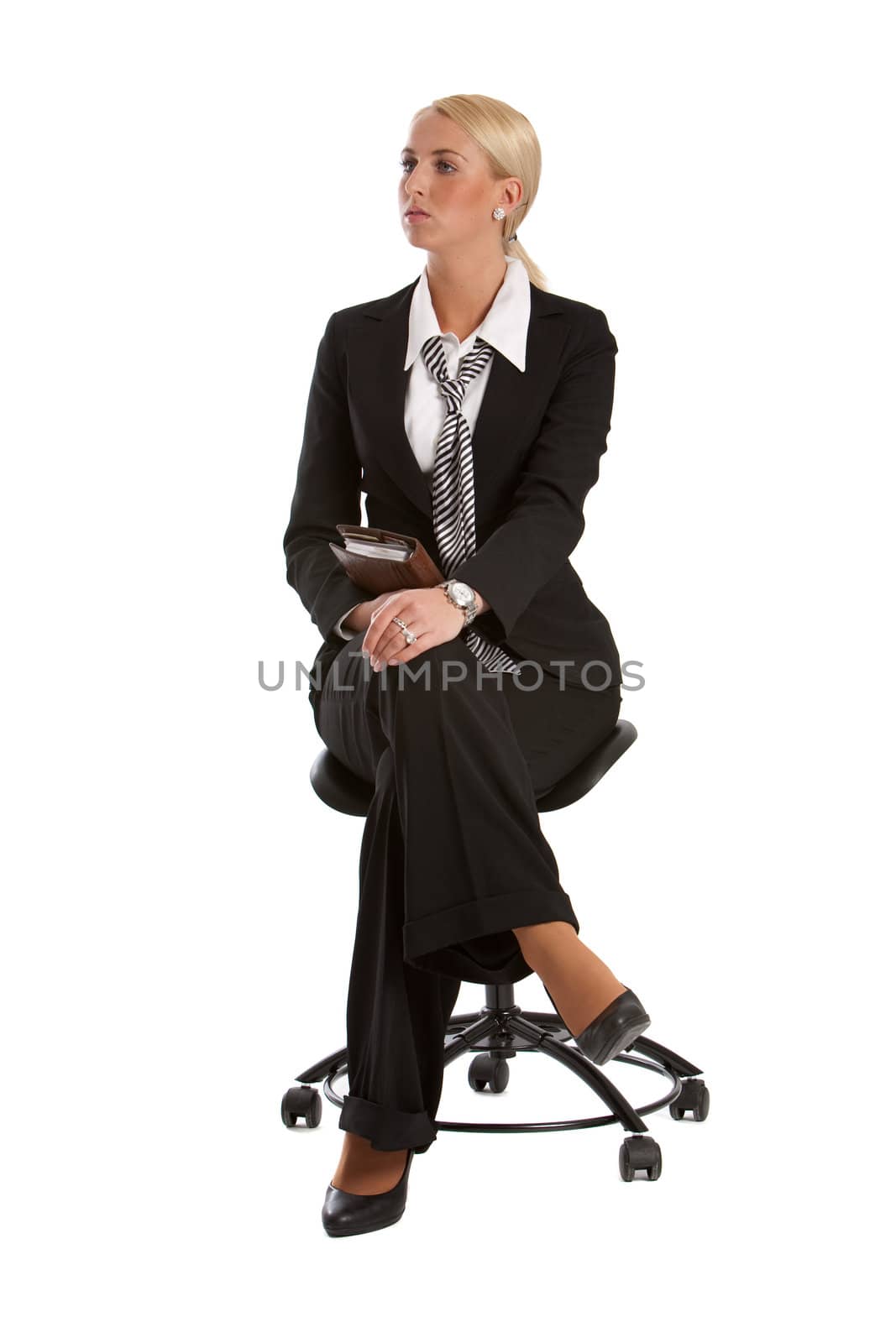 Business woman sitting on a chair patiently waiting on white background