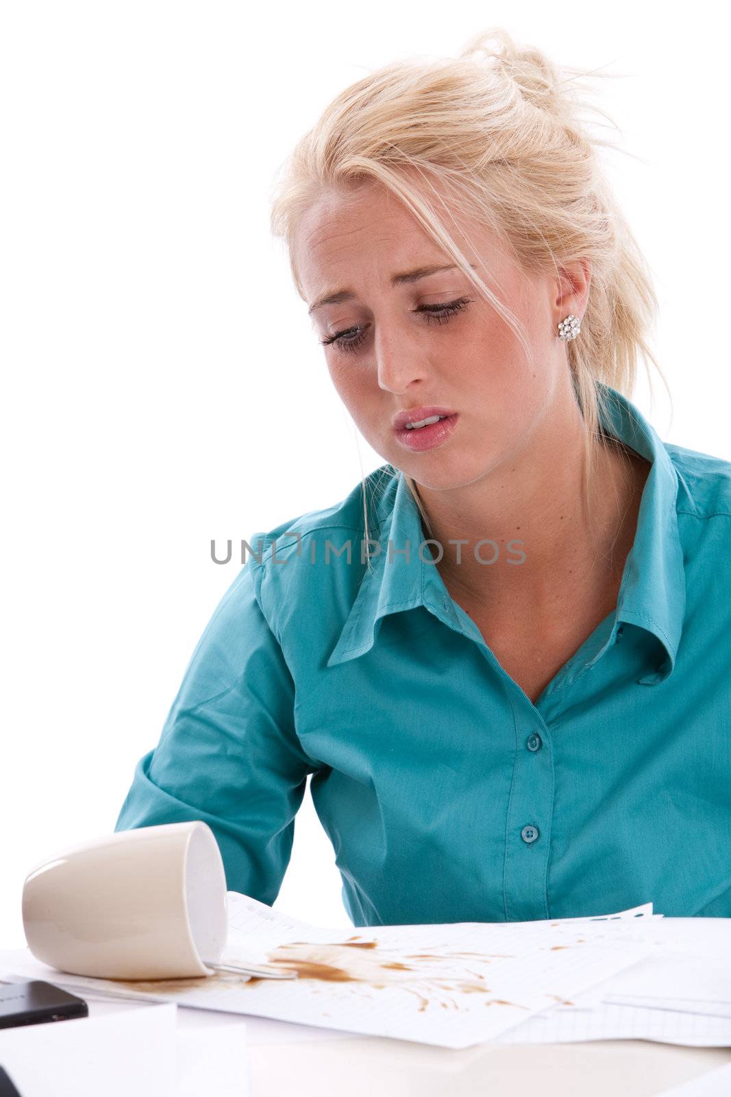 Secretary behind her papers having thrown coffee over it