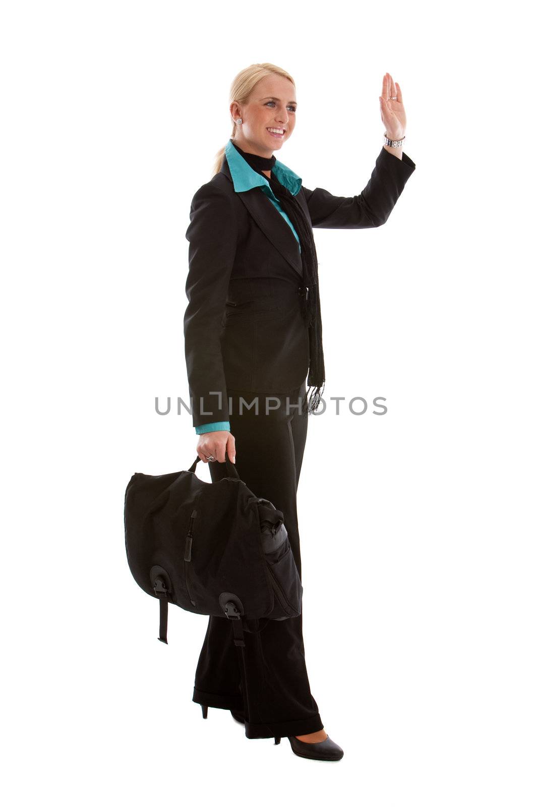 Business woman friendly greeting someone while holding a bag