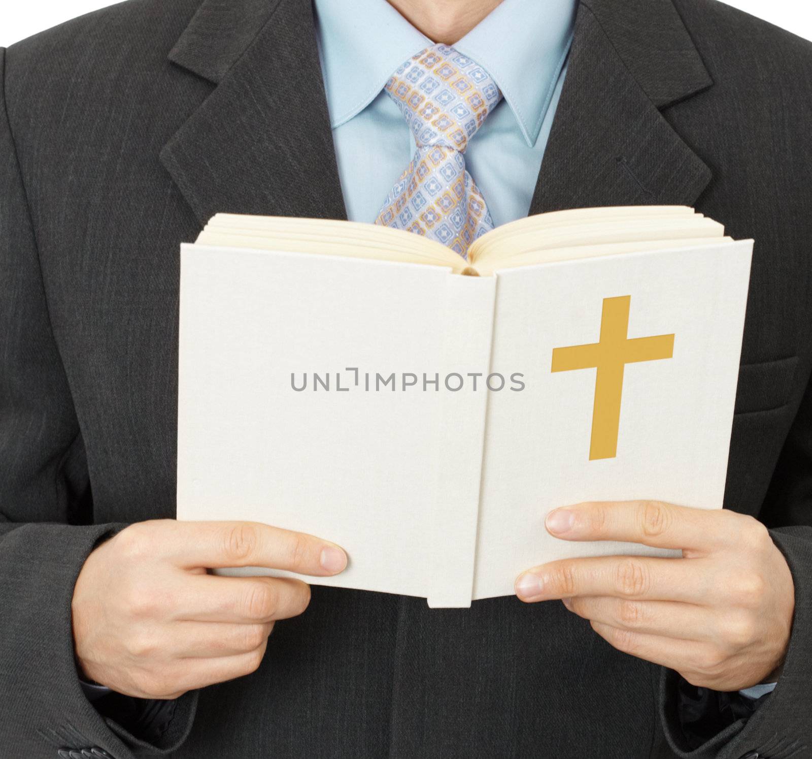 A man reads the Catholic Bible - closeup