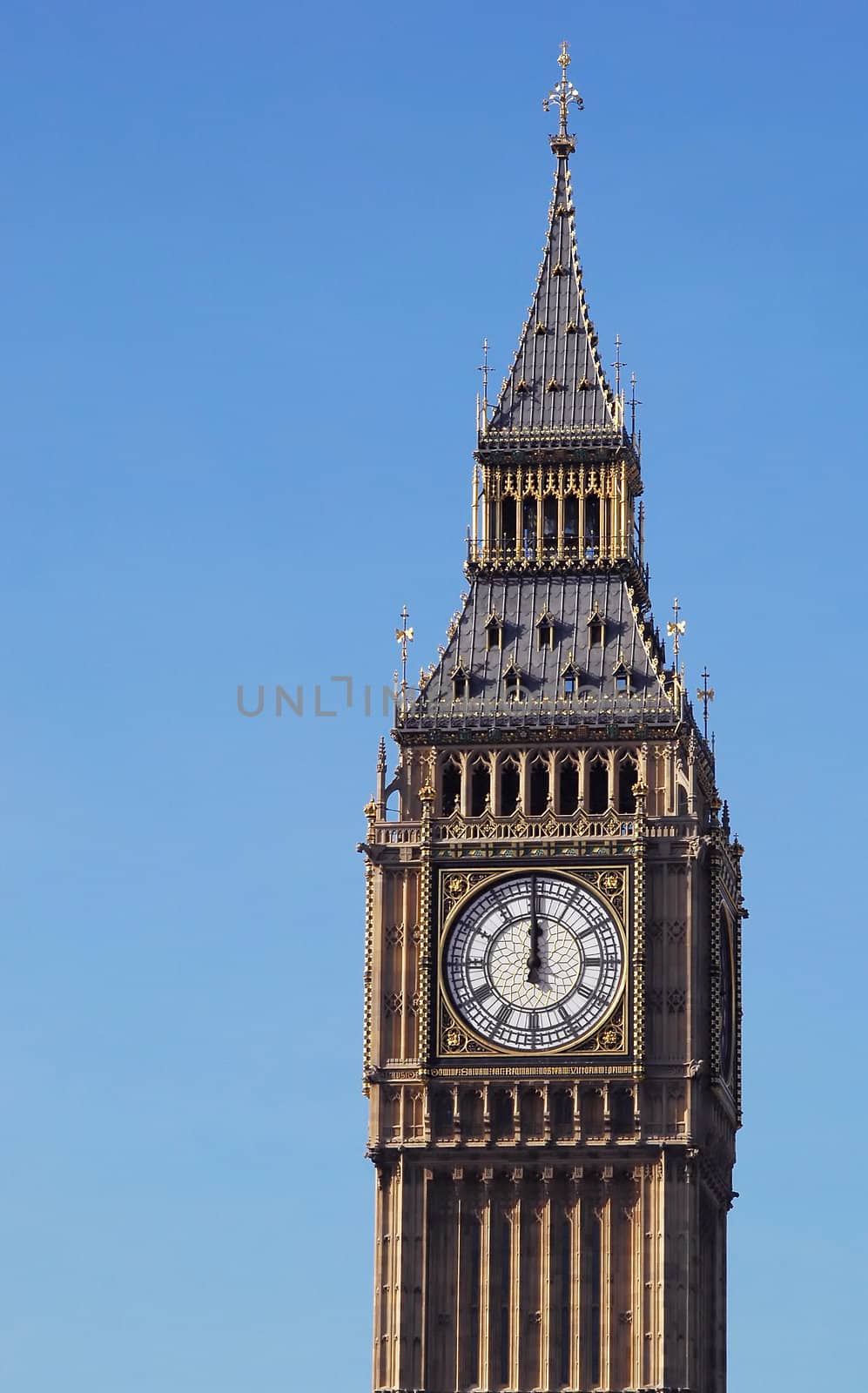 noon striking london's big ben clock tower