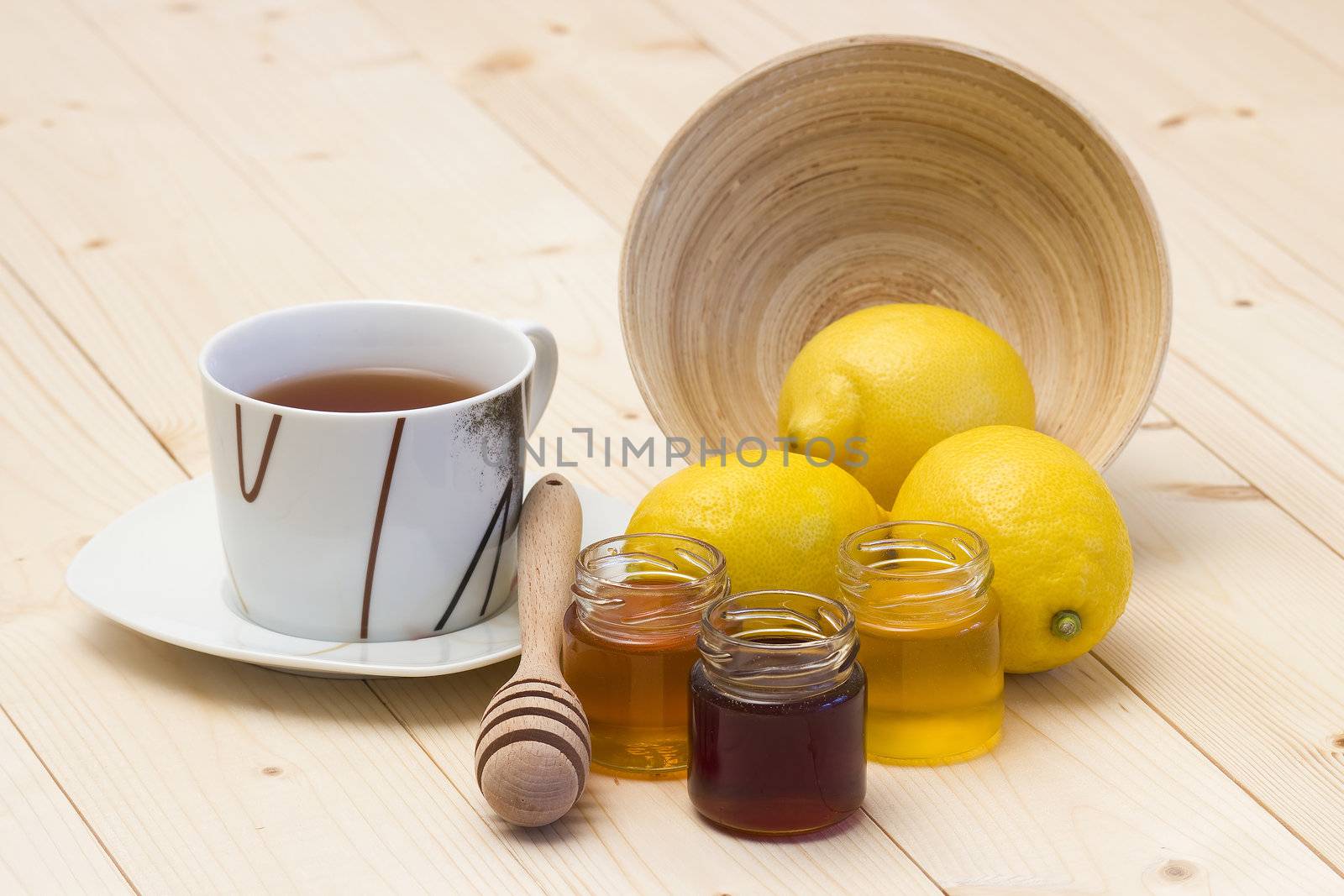 cup of tea, fresh lemons and honey