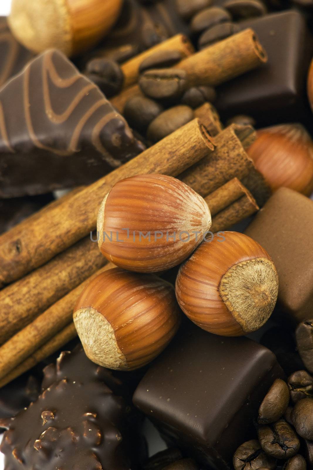chocolate, cinnamon, nuts, coffee beans by miradrozdowski